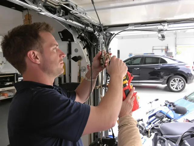 Rancho Cucamonga Garage Door Repair safety certified technician performing cable replacement in Rancho Cucamonga