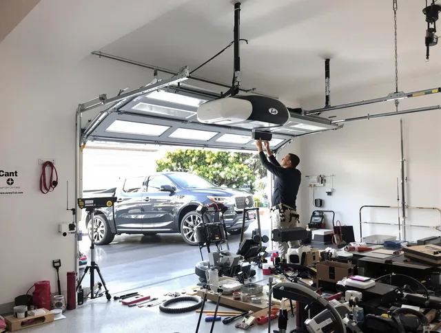 Rancho Cucamonga Garage Door Repair specialist installing smart garage door opener system in Rancho Cucamonga home